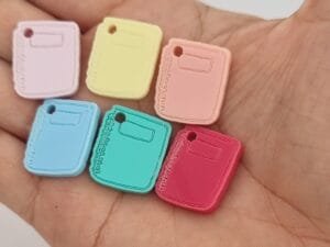 Pingente escolar caderno - pct c/6 und cores mistas