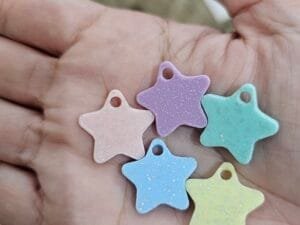 Pingente GLITTER Tons pasteis - Estrela misto c/5und